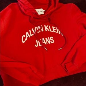 Red crop hoodie by Calvin